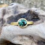 Oval 1.30ct teal sapphire ring